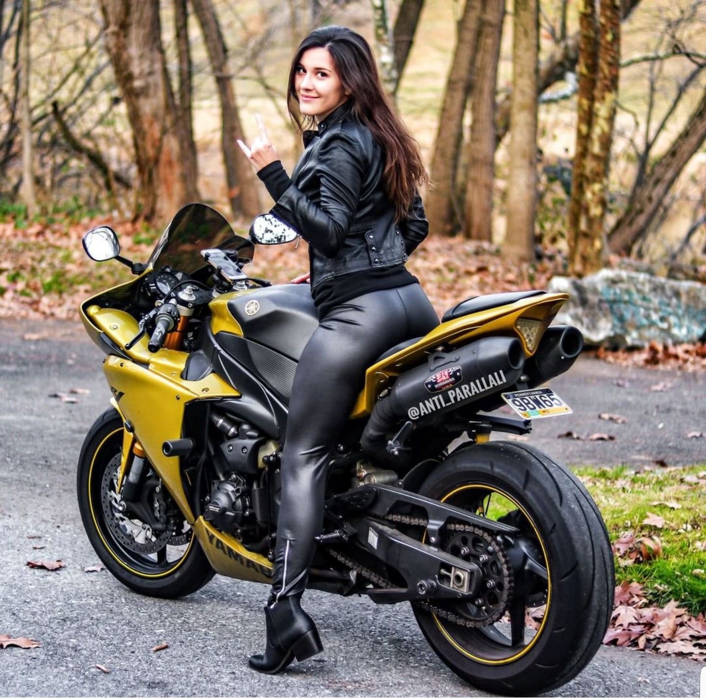 Sexy girl Brunettes on a motorcycle in Aomyn
